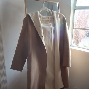 Tan and white winter coat